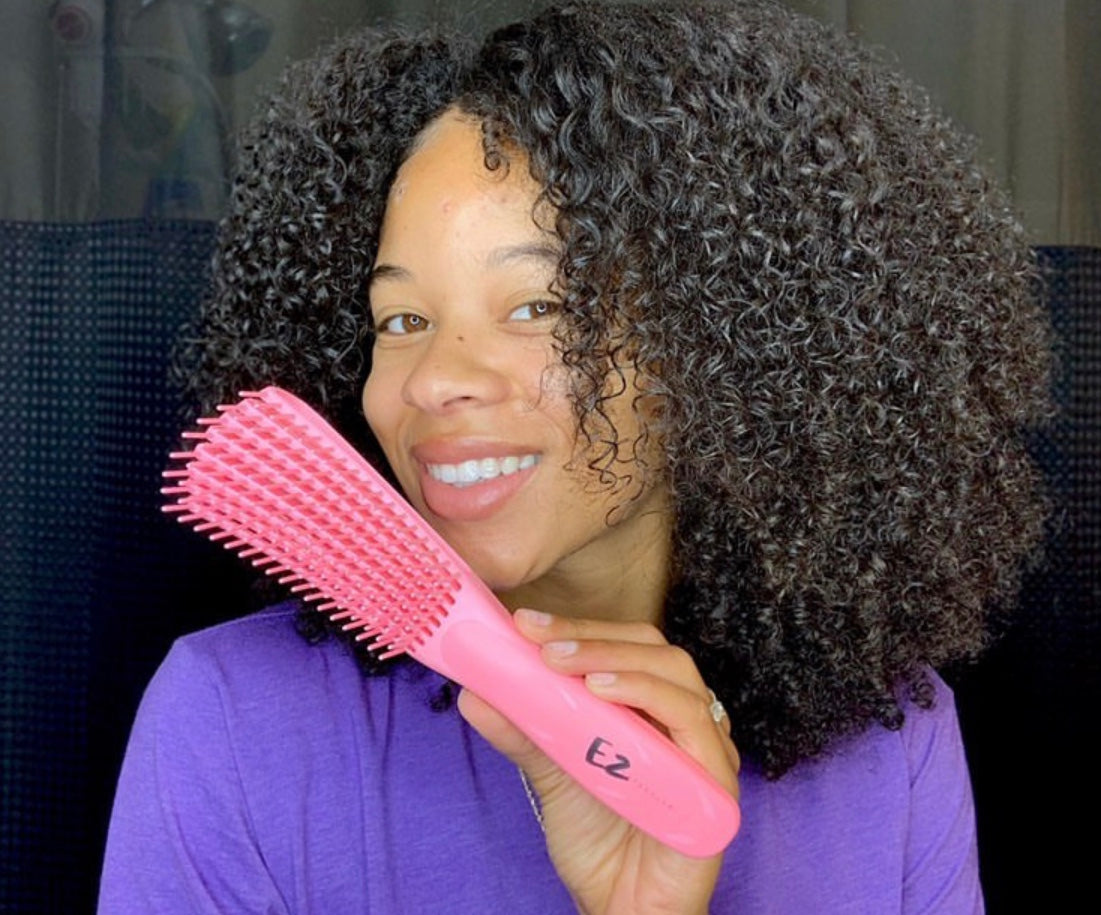 Why should you own an EZ Detangler Brush? Ez Detangler Brush